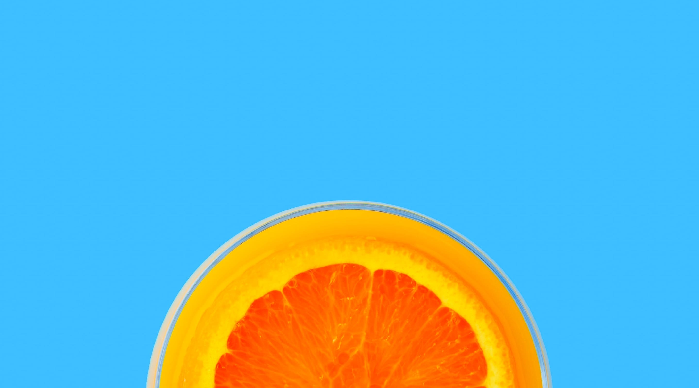 header image of cut orange