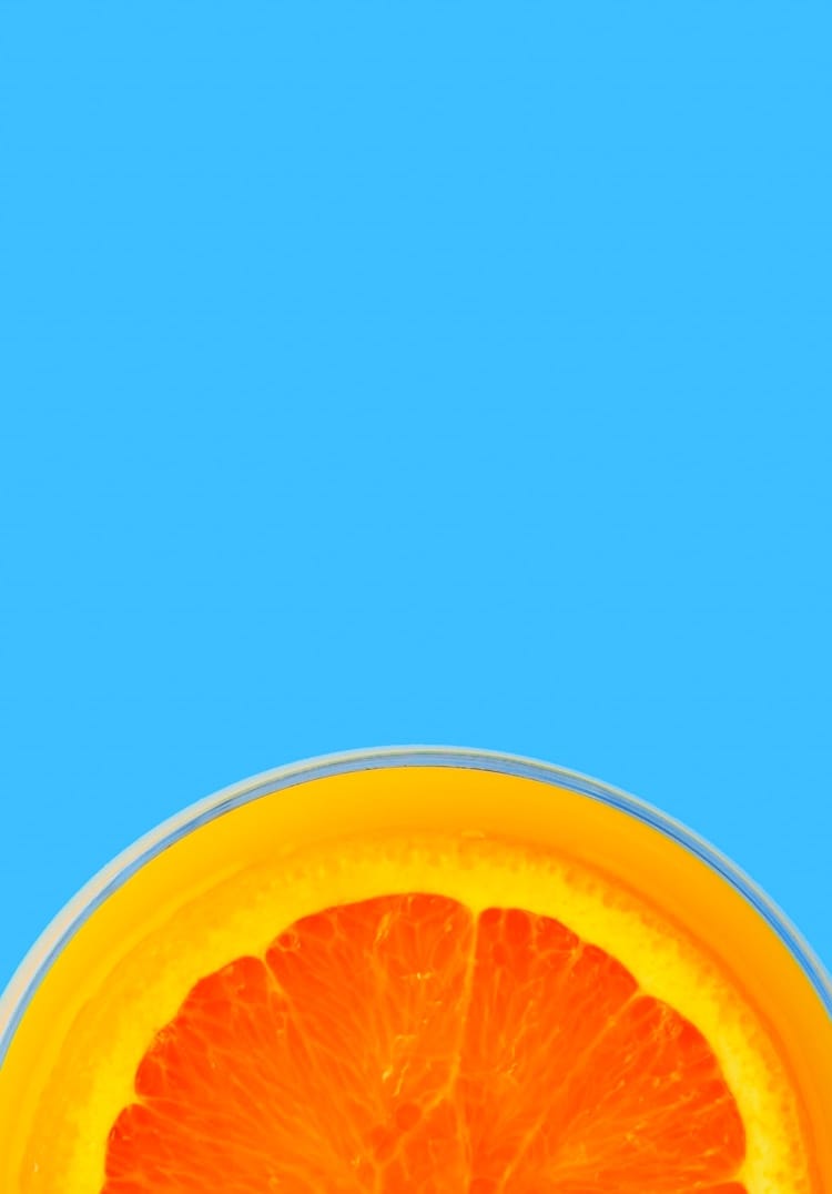 header image of cut orange